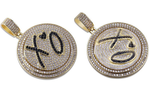 Iced Out 18k Gold XO Spinning Pendant