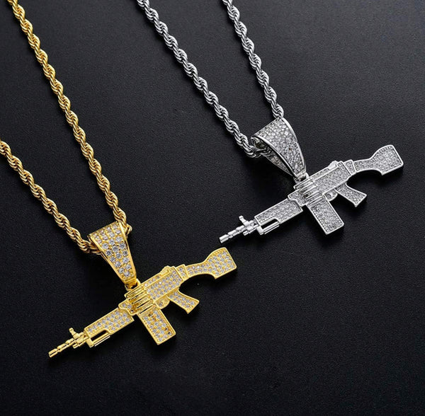 Iced Out 18k Gold Machine Gun Pendant