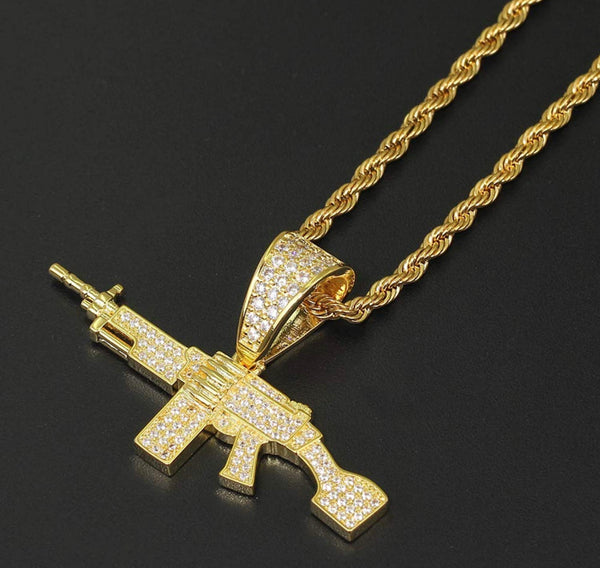 Iced Out 18k Gold Machine Gun Pendant